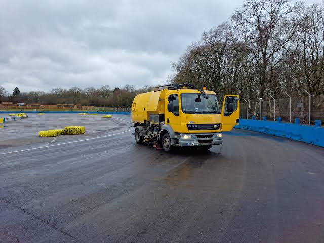 Road sweeper cleaning a street in London